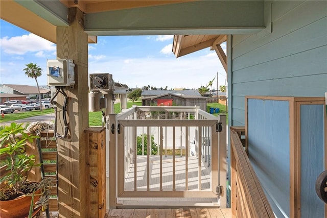 424 Trojan St, Port Aransas, TX 78373 - wooden terrace featuring a residential view