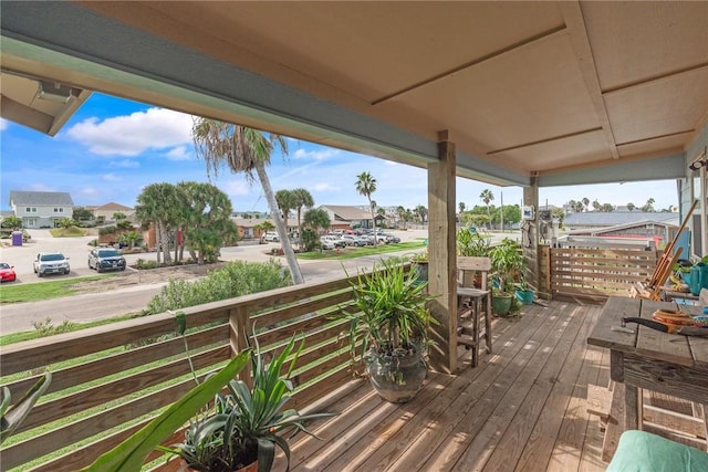 424 Trojan St, Port Aransas, TX 78373 - wooden porch with a residential view