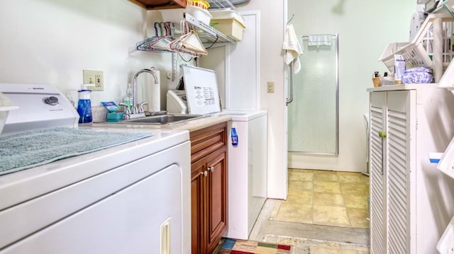 interior space with cabinets, separate washer and dryer, and sink