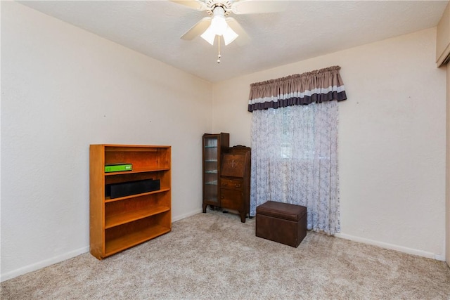 bedroom featuring baseboards and carpet