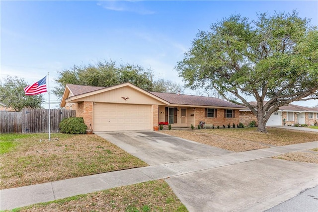 ranch-style house with brick siding, concrete driveway, a garage, and fence