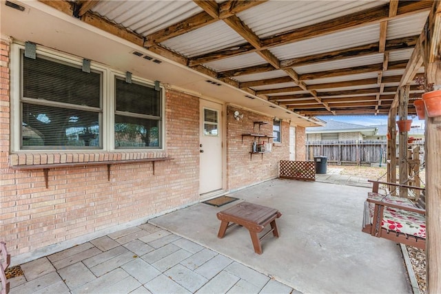 view of patio / terrace with fence