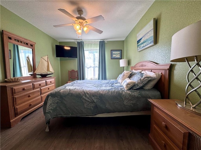 15125 Leeward Dr Unit 10, Corpus Christi, TX 78418 - bedroom with a textured wall, wood finished floors, a textured ceiling, and ceiling fan