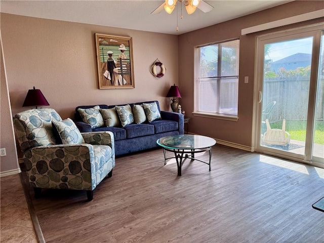 15125 Leeward Dr Unit 10, Corpus Christi, TX 78418 - living area with a ceiling fan and wood finished floors