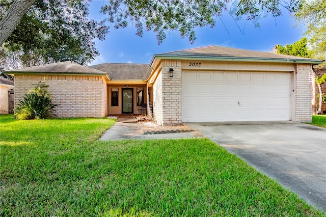 ranch-style house with a front lawn and a garage