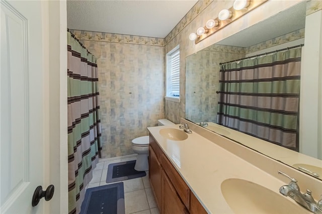 bathroom with curtained shower, tile patterned flooring, a textured ceiling, toilet, and vanity