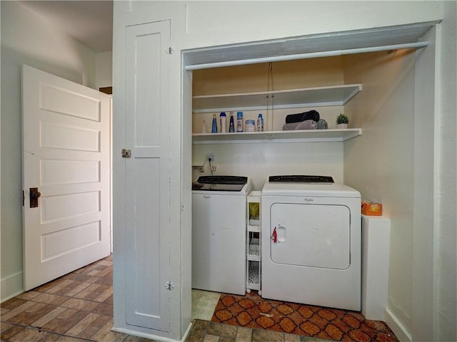 washroom with separate washer and dryer