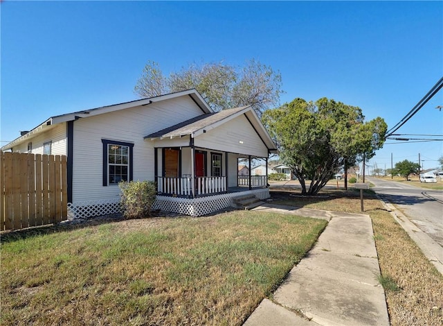 view of front facade with a porch and a front yard