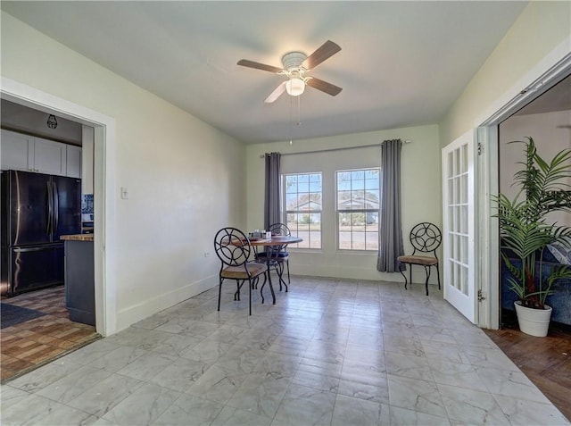 dining room with ceiling fan