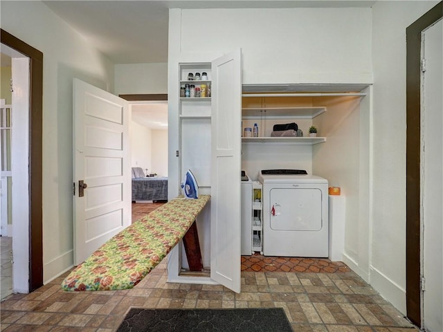 laundry room with washer and dryer