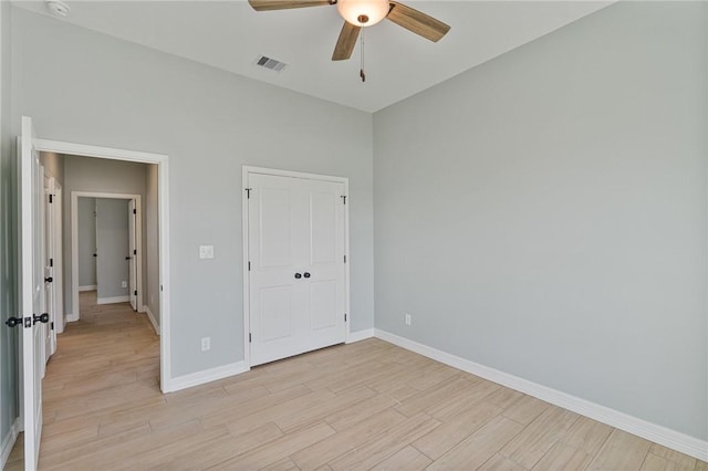 4338 Starlite, Corpus Christi, TX 78410 - unfurnished bedroom with light wood-style floors, baseboards, a ceiling fan, and visible vents