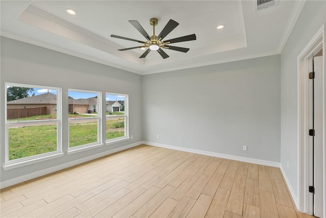 4338 Starlite, Corpus Christi, TX 78410 - empty room featuring light wood-style floors, a raised ceiling, baseboards, and visible vents