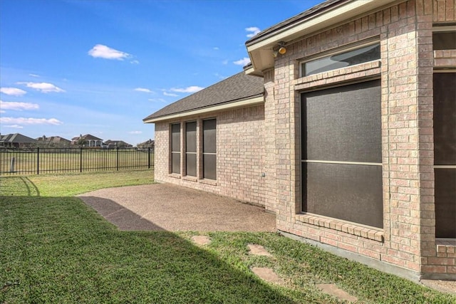 view of yard featuring a patio area and fence