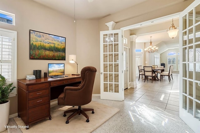 home office featuring light tile patterned floors, baseboards, an inviting chandelier, and french doors