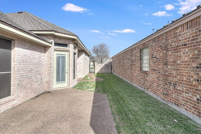 view of yard with a patio area and fence