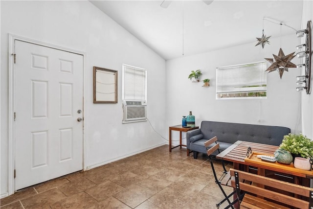4430 Mistletoe Dr, Corpus Christi, TX 78411 - entrance foyer featuring vaulted ceiling, cooling unit, stone finish floors, and a ceiling fan