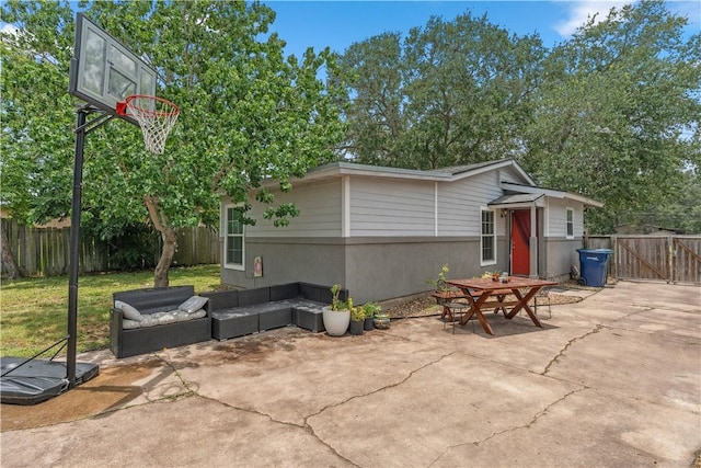 4430 Mistletoe Dr, Corpus Christi, TX 78411 - fenced backyard with a patio area, a gate, and outdoor lounge area