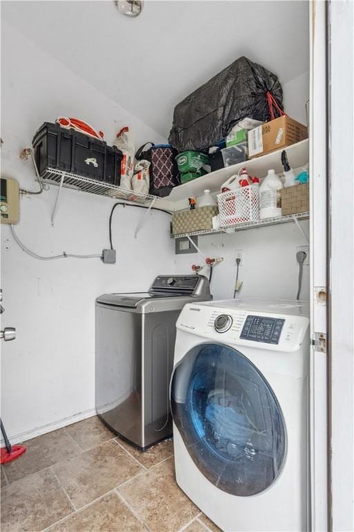 4430 Mistletoe Dr, Corpus Christi, TX 78411 - laundry area featuring separate washer and dryer and light stone finish flooring