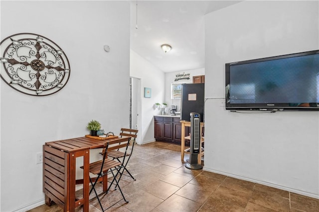 4430 Mistletoe Dr, Corpus Christi, TX 78411 - dining room with lofted ceiling and baseboards