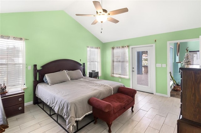 bedroom with access to exterior, light wood-type flooring, high vaulted ceiling, and ceiling fan