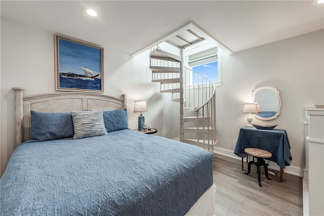 bedroom featuring hardwood / wood-style flooring