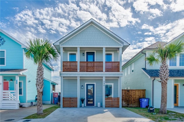 view of front of house featuring a balcony and a porch