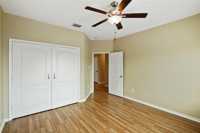 7445 Lake Micala Dr, Corpus Christi, TX 78413 - unfurnished bedroom featuring light wood-type flooring, a closet, and ceiling fan