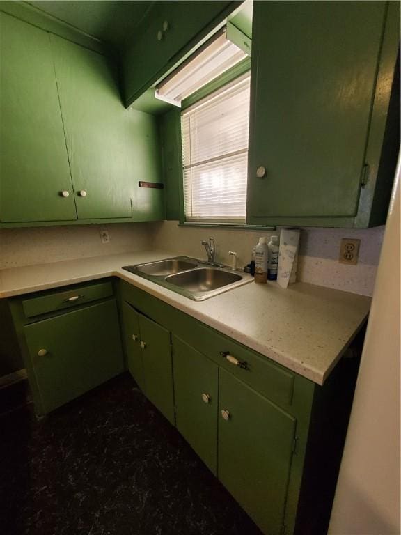 1041 Whitaker Dr, Corpus Christi, TX 78412 - kitchen featuring green cabinets and light countertops