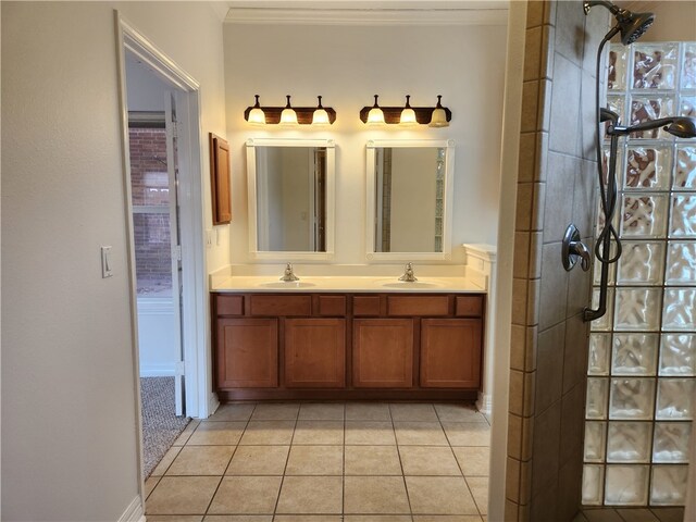 bathroom with vanity, tile patterned flooring, and ornamental molding