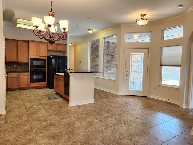 kitchen with pendant lighting, an inviting chandelier, ornamental molding, black appliances, and decorative backsplash