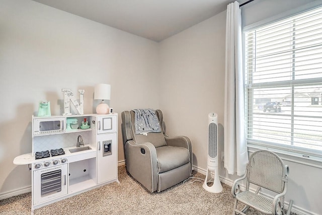 7510 Lasso Dr, Corpus Christi, TX 78414 - living area with healthy amount of natural light, light colored carpet, and baseboards