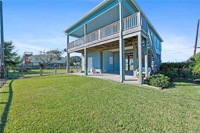 back of house featuring a patio, a deck, and stairway