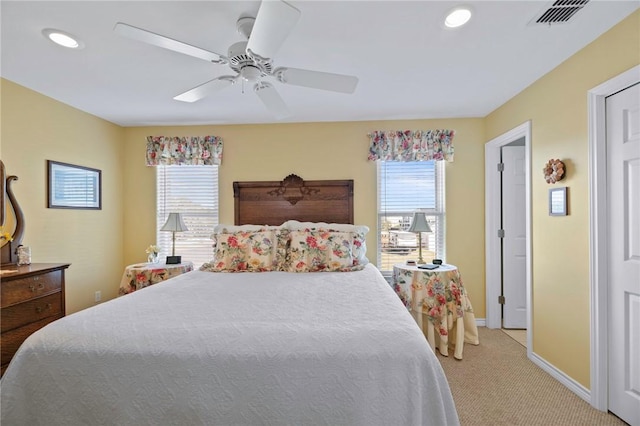 bedroom featuring light carpet, baseboards, ceiling fan, and recessed lighting
