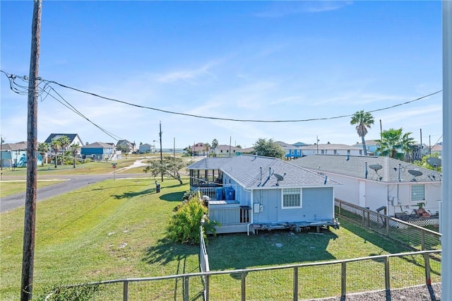 view of front of home with a residential view and a deck