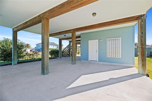 view of patio featuring stairway
