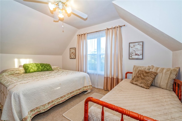 carpeted bedroom with ceiling fan and lofted ceiling