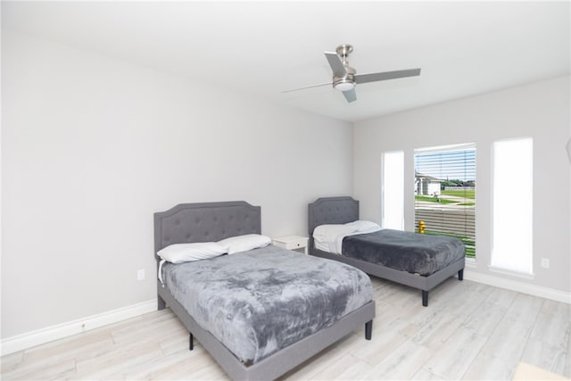 6701 Paddington Dr, Corpus Christi, TX 78414 - bedroom with baseboards, a ceiling fan, and wood finished floors