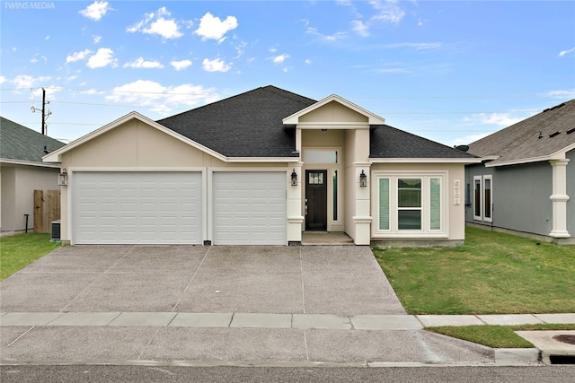 6701 Paddington Dr, Corpus Christi, TX 78414 - view of front of home featuring stucco siding, roof with shingles, a front lawn, an attached garage, and concrete driveway