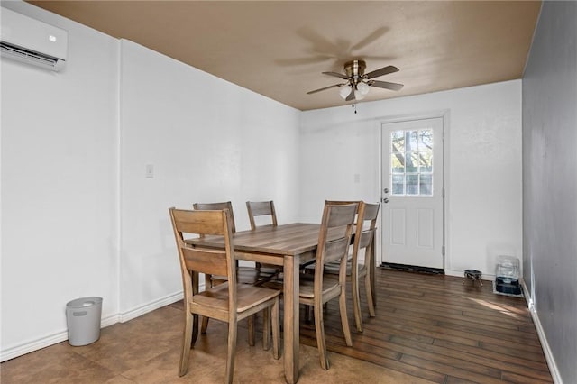 dining room with ceiling fan, baseboards, dark wood-style floors, and an AC wall unit