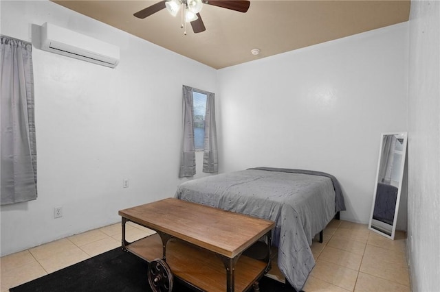 bedroom with a wall unit AC, ceiling fan, and light tile patterned floors