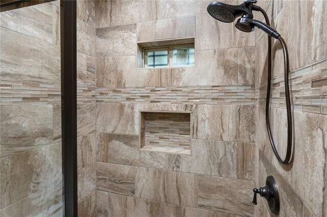 room details with a tile shower