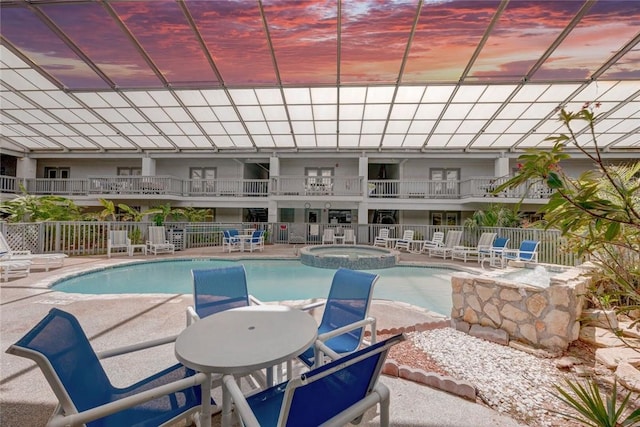 14825 Windward Dr Unit 111, Corpus Christi, TX 78418 - view of swimming pool with a patio area, fence, and a pool with connected hot tub
