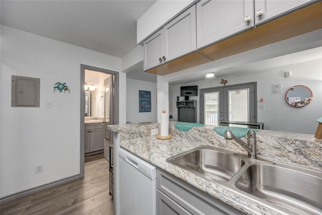 14825 Windward Dr Unit 111, Corpus Christi, TX 78418 - kitchen with a sink, white dishwasher, electric panel, light wood finished floors, and french doors