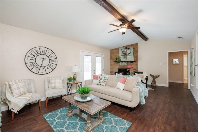 living area with lofted ceiling with beams, a fireplace, wood finished floors, visible vents, and baseboards