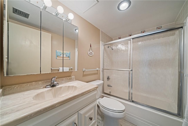 14810 Windward Dr Unit 301, Corpus Christi, TX 78418 - full bathroom featuring vanity and bath / shower combo with glass door