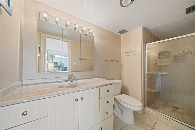 14810 Windward Dr Unit 301, Corpus Christi, TX 78418 - full bathroom with a stall shower, vanity, and tile patterned flooring