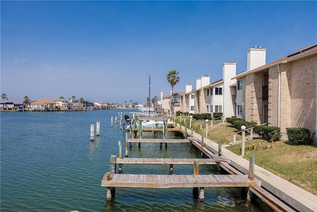 view of dock featuring a water view and boat lift