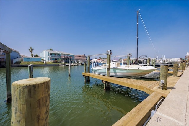 dock area featuring a water view and boat lift