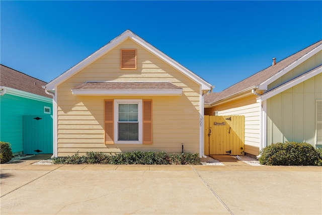 entrance to property with a patio