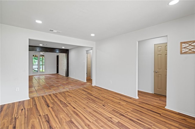 6106 Orangewood Dr, Corpus Christi, TX 78412 - empty room with wood finished floors and recessed lighting
